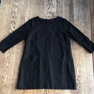 Black wool short back zip dress